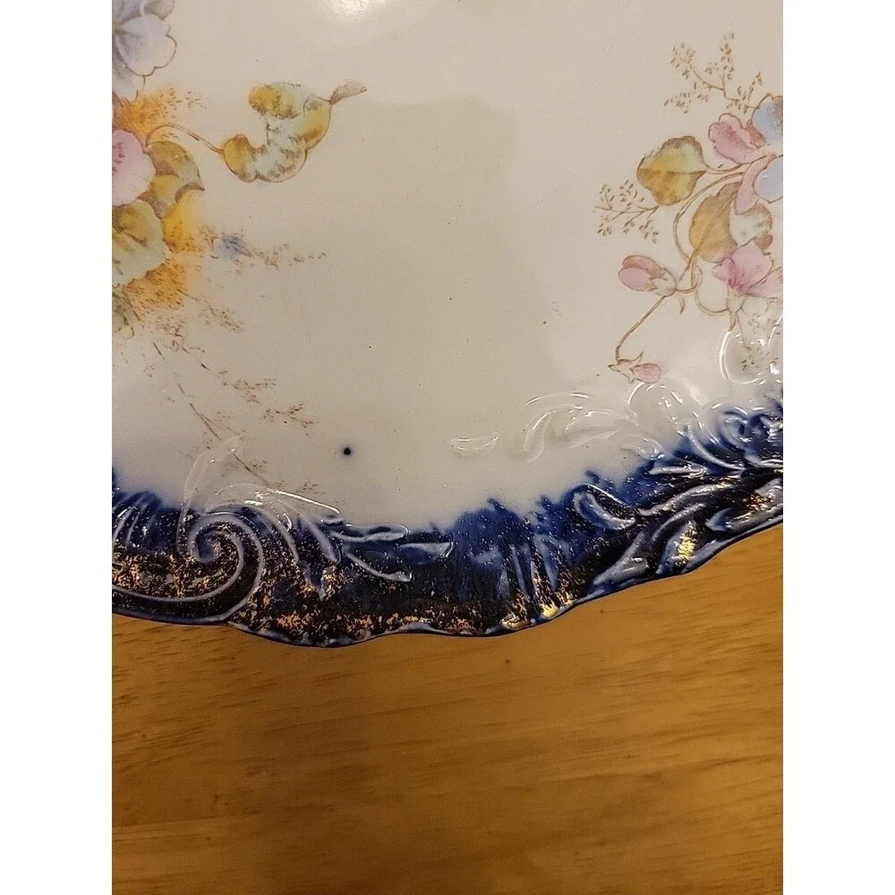 Porcelain 9in plate look/quality of R.S. Prussia Or other fine German Ware